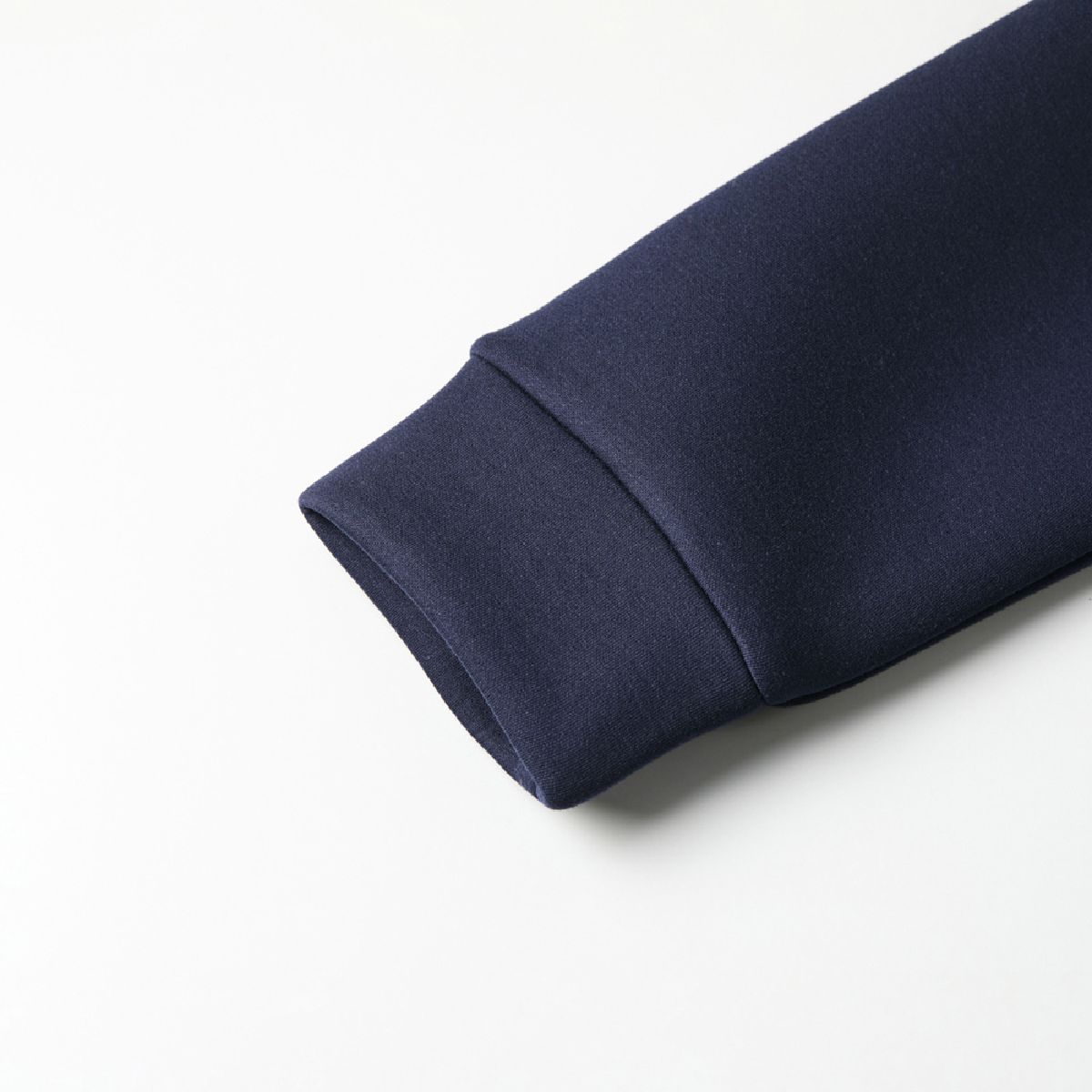 The cuffs are made of the same fabric as the body.