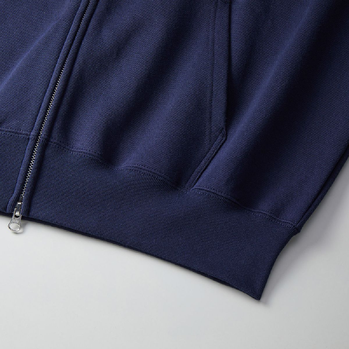 The ribs at the hem and the seam line of the body are robust two needles