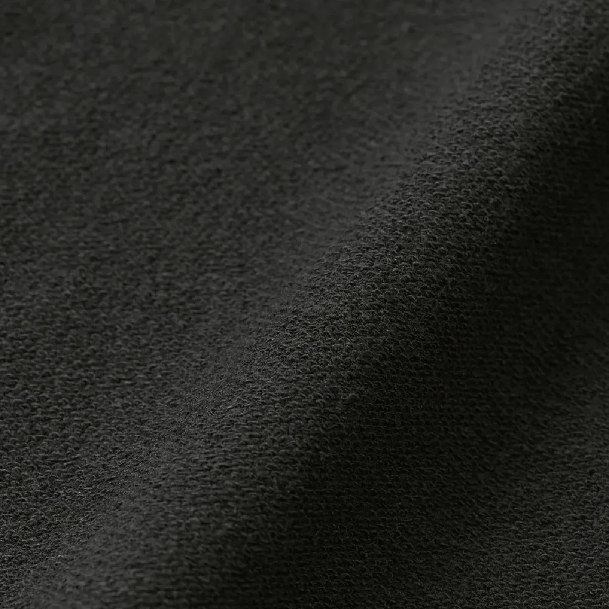 The backside features a backing pile (back fur) with elasticity and water absorption.