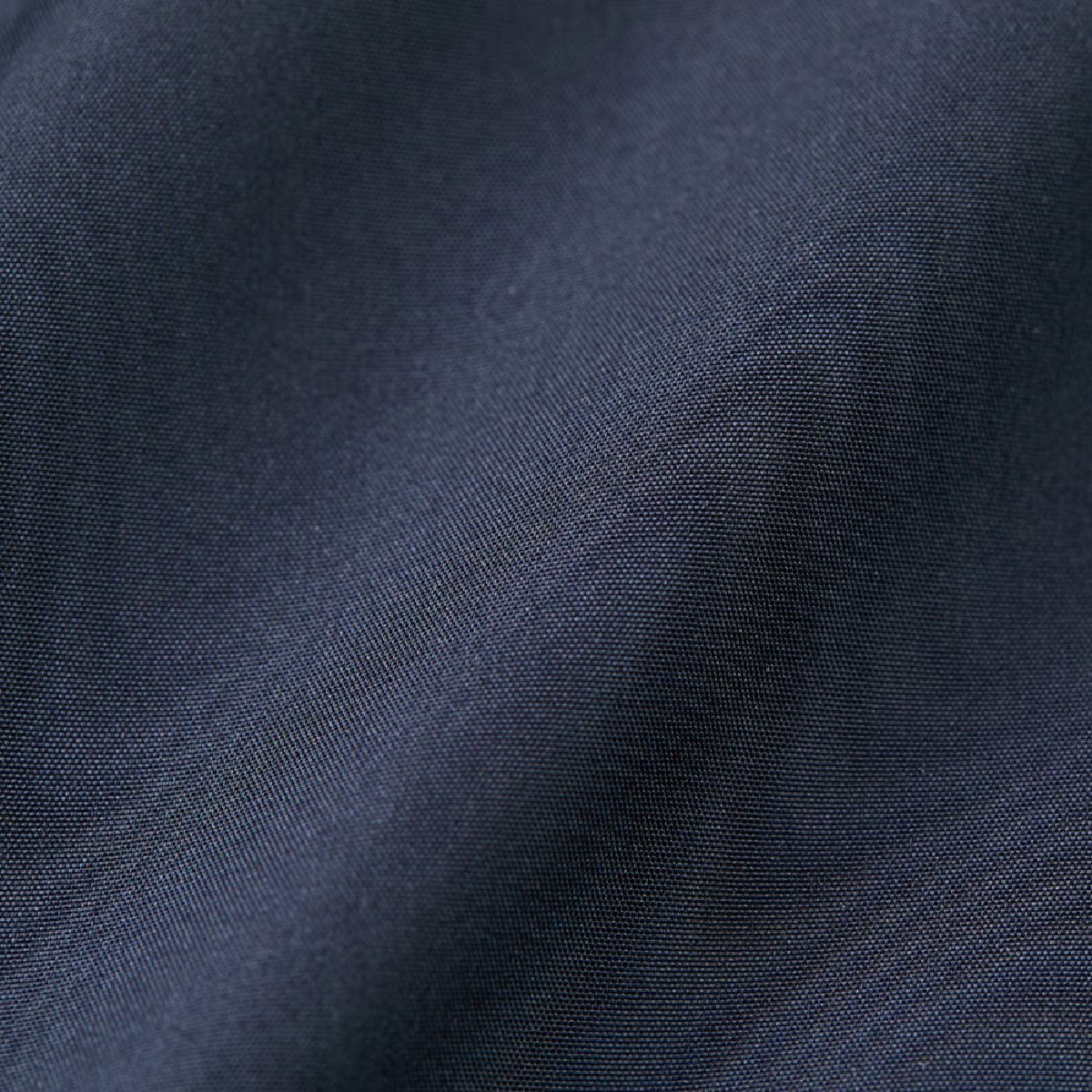 The outer fabric features an acrylic coating that creates a crisp, structured feel.