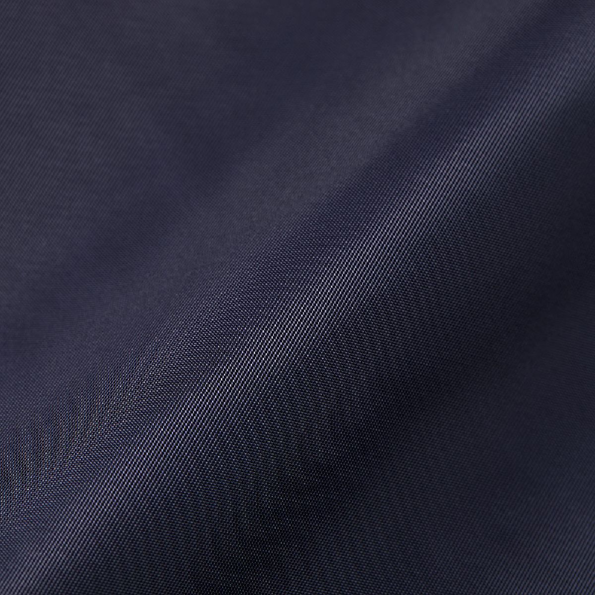 Nylon twill fabric with a refined sheen and a premium feel.