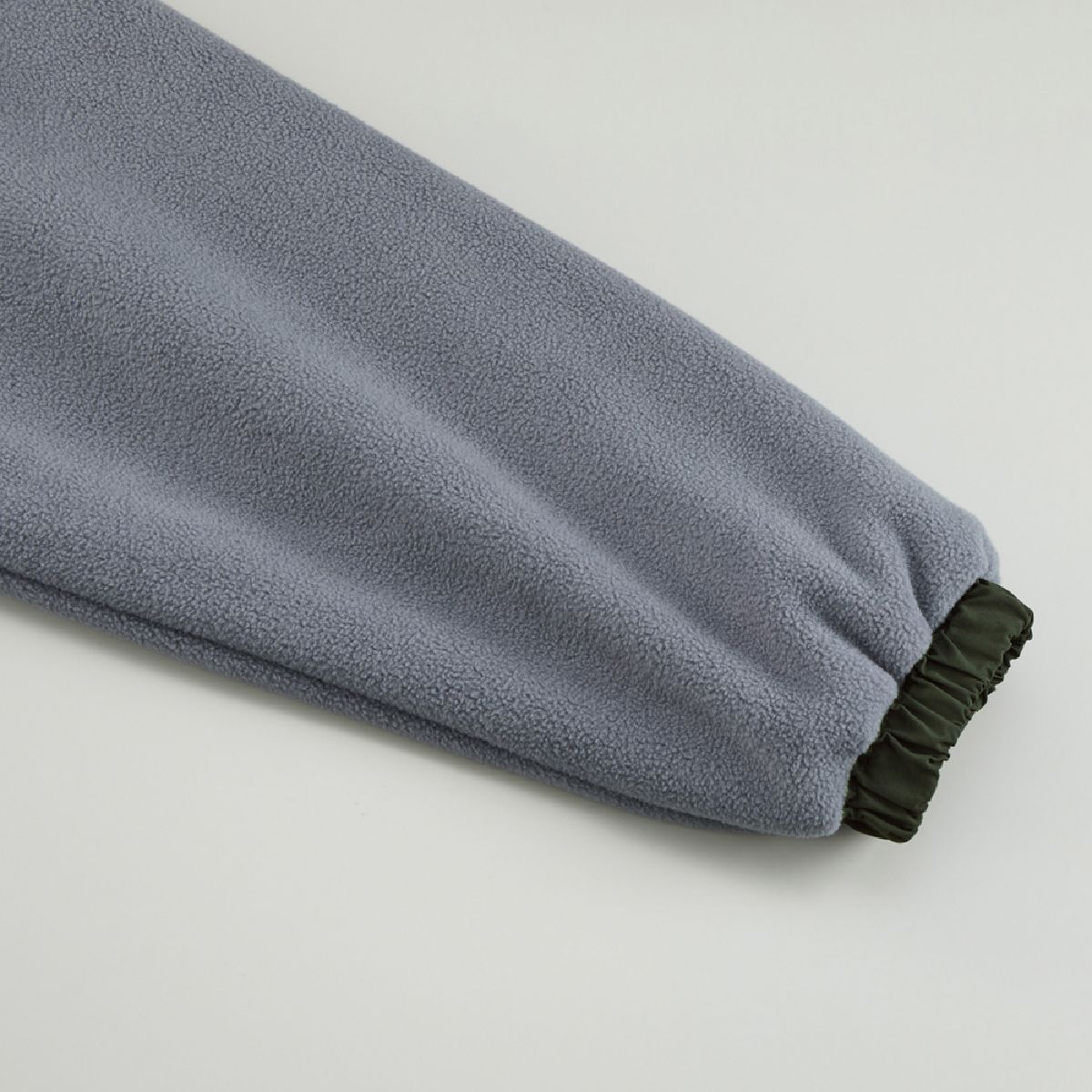 The cuffs feature nylon shirring (on both sides).