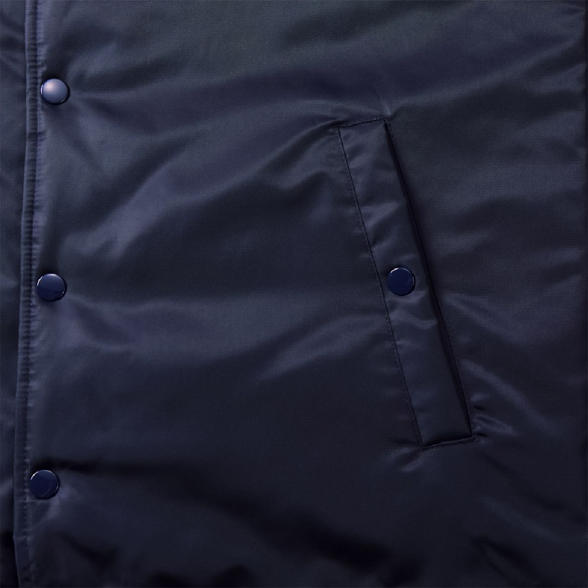 Features metal American-style snap buttons on the front and pockets.